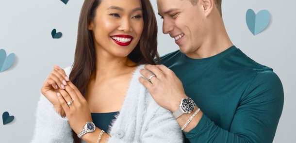 Couple wearing gold luxury watches | Valentine's Day Luxury Watch Gift Ideas | REEDS Jewelers